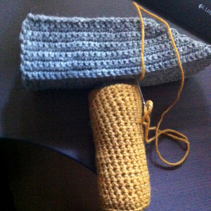 Hammer head and handle sewed together