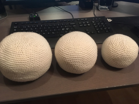 Three crochet snowballs